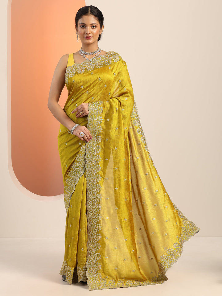mustard embroidered silk blend saree