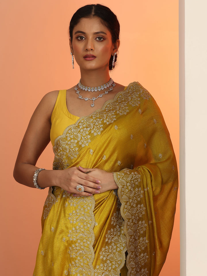 mustard embroidered silk blend saree