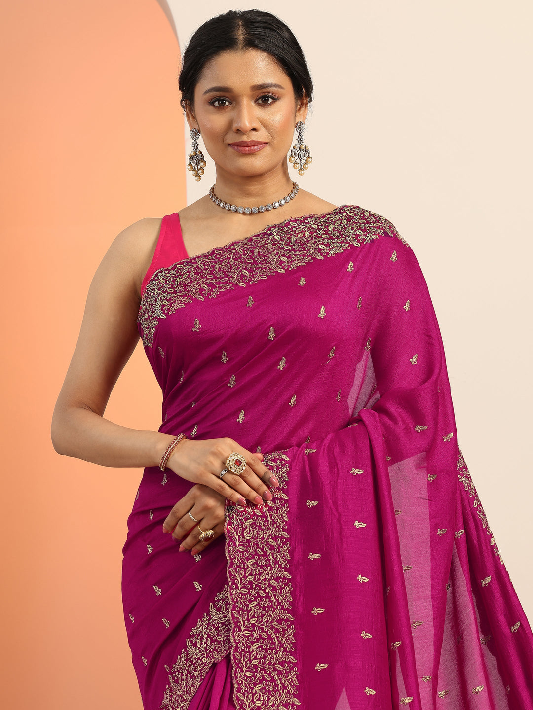 magenta embroidered silk blend saree