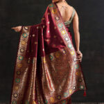 maroon woven design silk blend saree