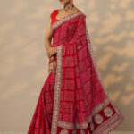 red bandhani printed silk blend saree