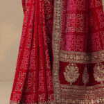 red bandhani printed silk blend saree