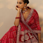 red bandhani printed silk blend saree